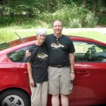 Tom and Margie by the Prius